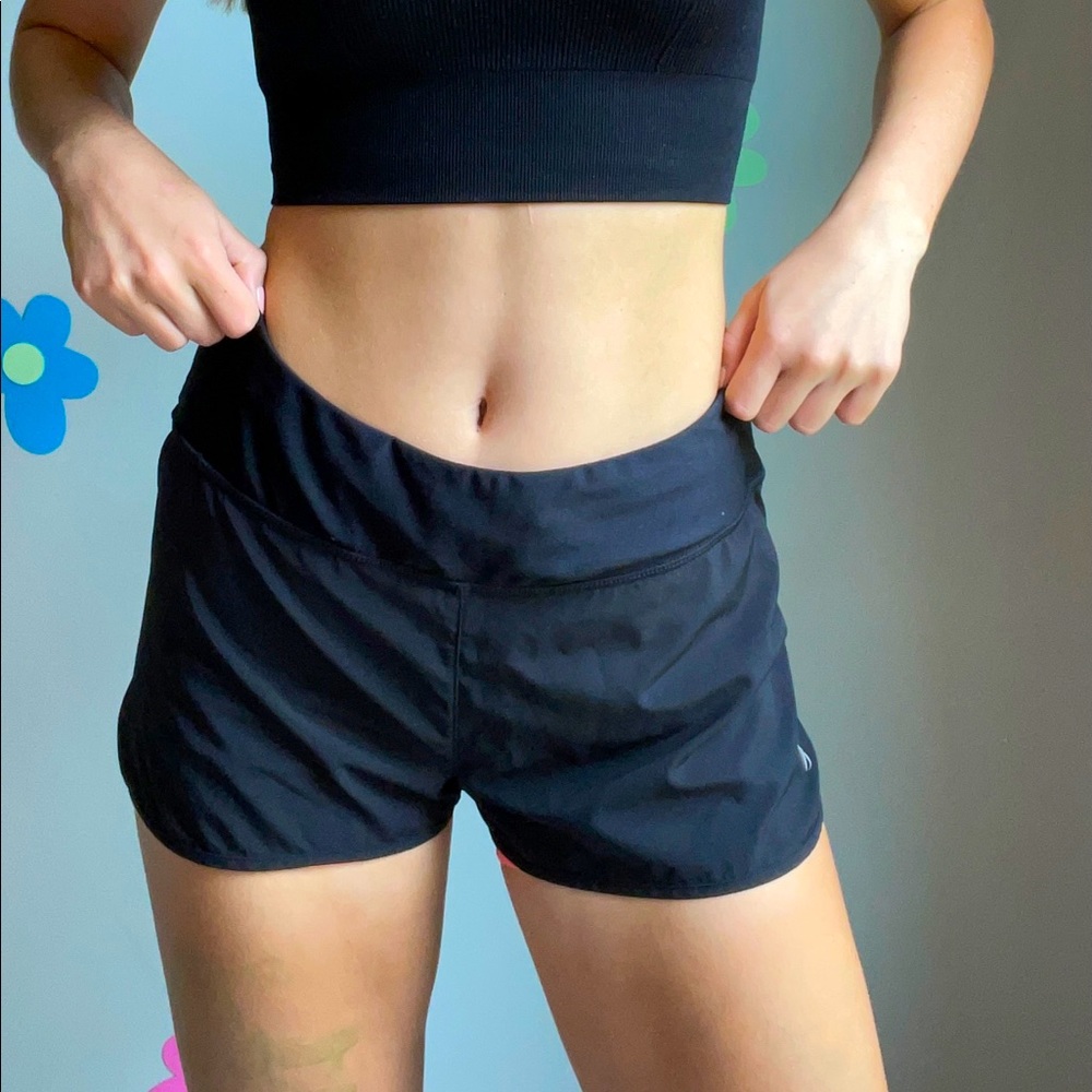 MPG black athletic shorts with neon pink spandex